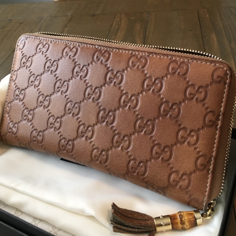 Gucci Brown Embossed Leather Zip-Around Wallet with Tassel